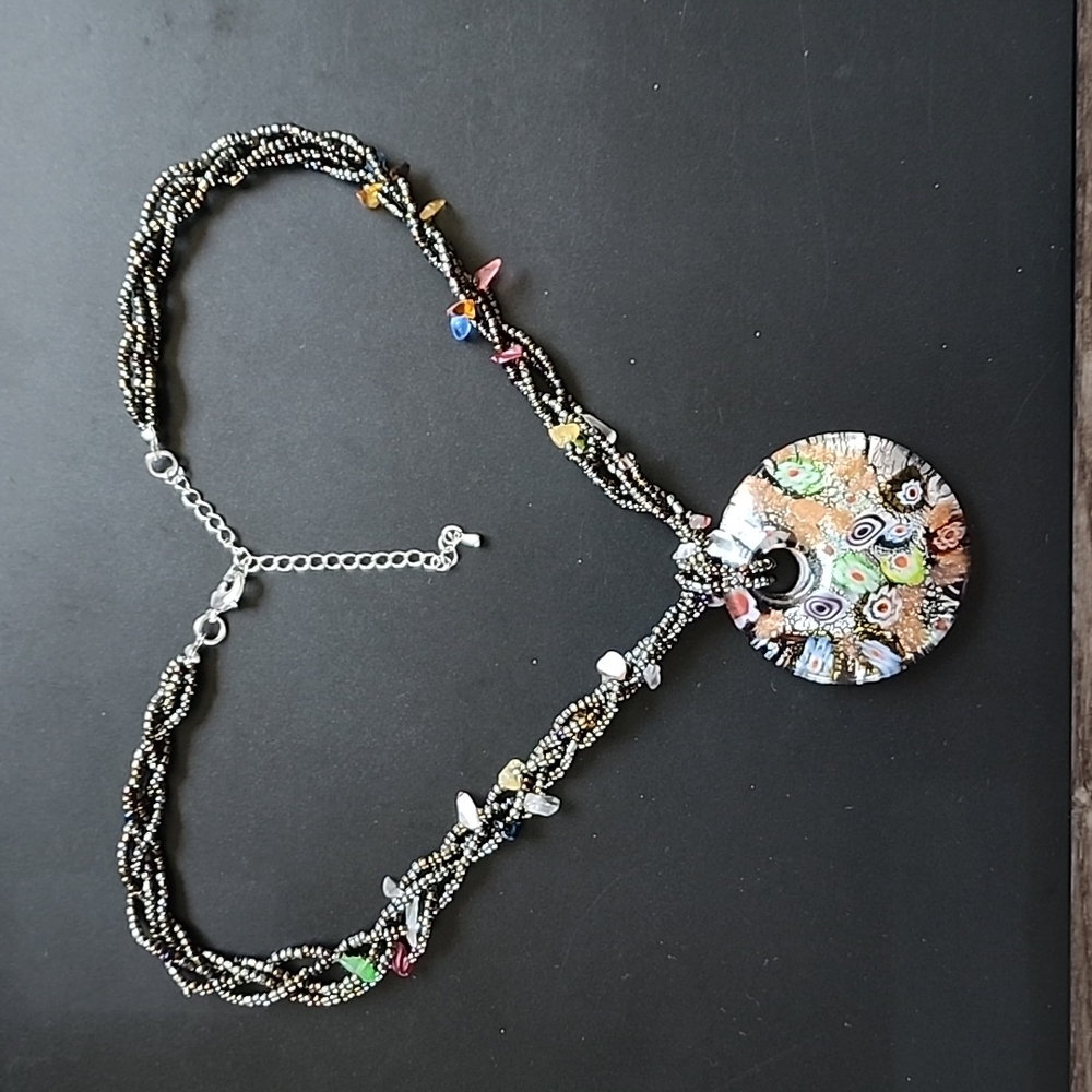 glass pendant floral necklace. This one has an adjustable clasp closure.